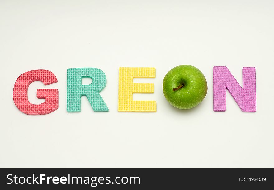 A green apple in a green alphabet