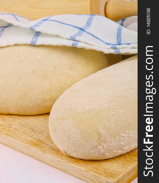 Wheat bread dough. Close up on white background