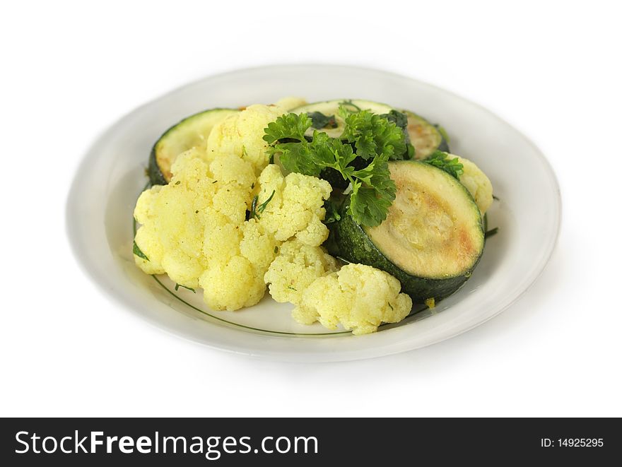 Stewed vegetables in a bowl on a white background