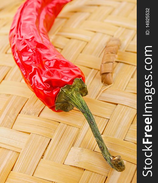 Red chili pepper. Close up on a wodden basket