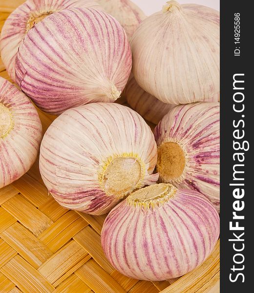 Garlic. Close up in a wodden basket