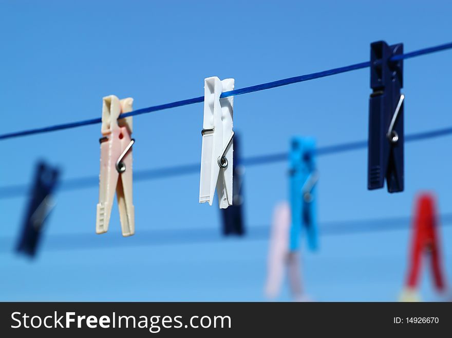 Cloth Pegs With A Under The Blue Sky