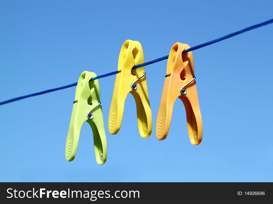 Cloth Pegs With A Under The Blue Sky