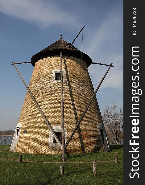Old windmill on the lake
