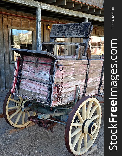 Old weathered western wooden buggy. Old weathered western wooden buggy