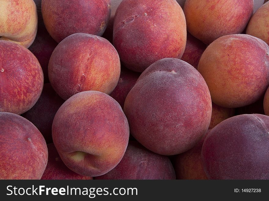 Pile of read fresh peaches. Pile of read fresh peaches