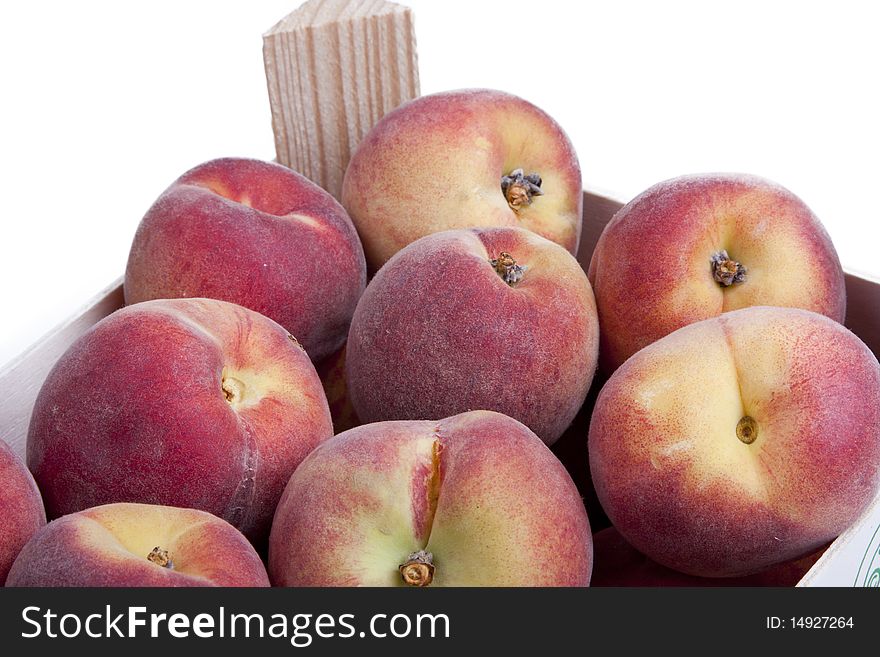 Detail of a crate of peaches