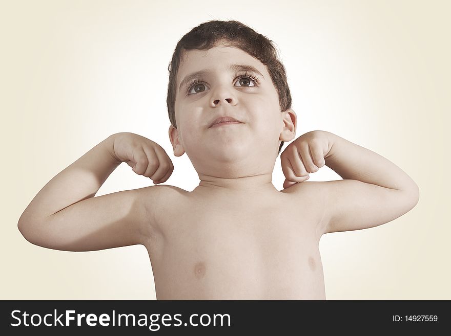 Child with arms in air, showing off his muscles or cheering. Child with arms in air, showing off his muscles or cheering
