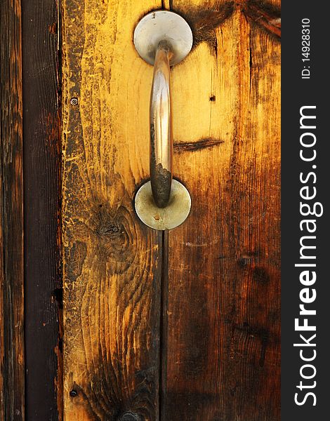 Old wooden door with doorknob