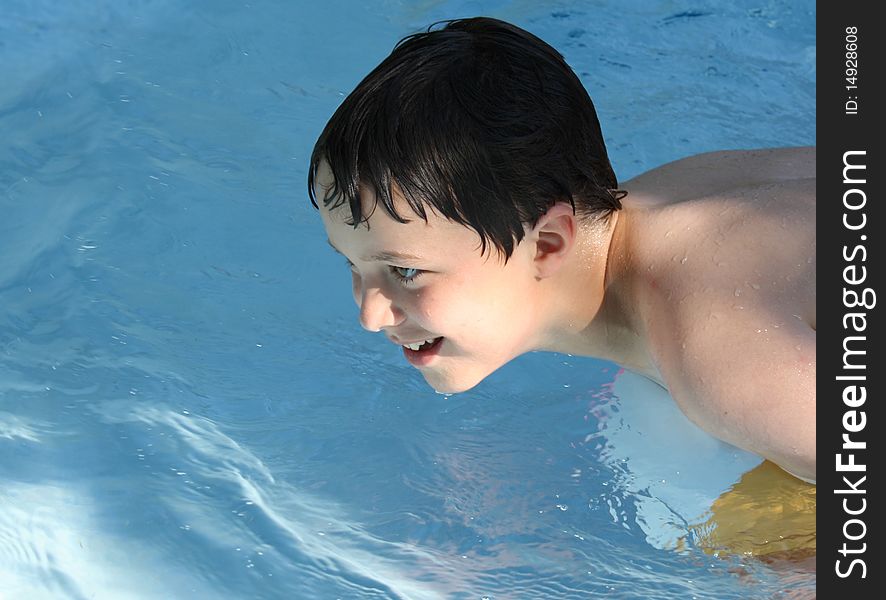 Sunlit Boy In Pool