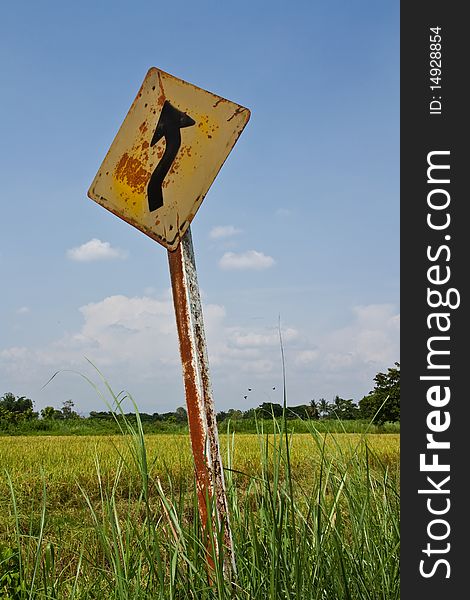 Image of traffic sign in the rice field