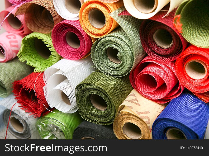 Background of rolls of material for flower bouquets