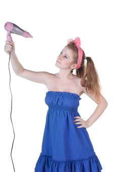 Red-haired Girl With The Hair Dryer. Stock Image Red-haired Girl With The Hair Dryer. Stock Image