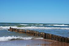 Breakwater At Sea Stock Photo