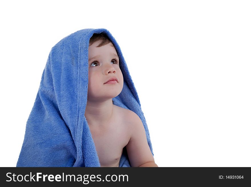 Little boy in towel looking away. Little boy in towel looking away
