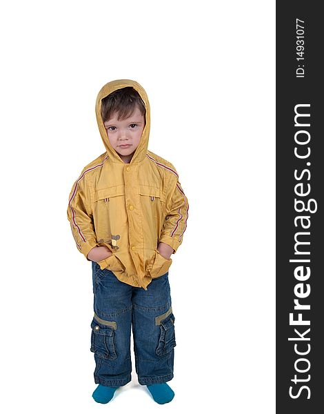 Boy in yellow jacket posing on a white background. Boy in yellow jacket posing on a white background