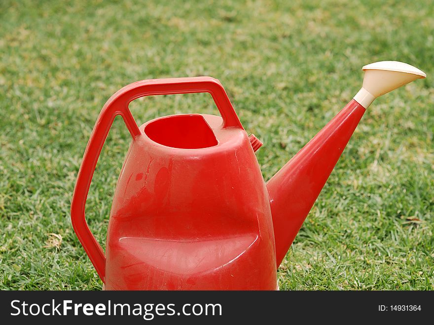 An old dusting watering can