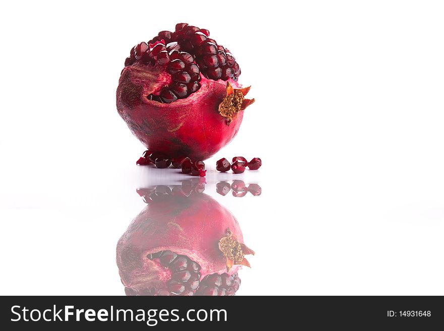 Image of a Pomegranate with a reflection. Image of a Pomegranate with a reflection