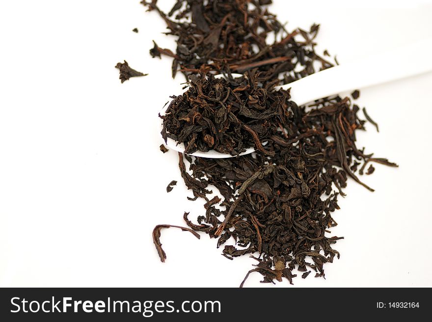 A spoon full of freshly processed tea leaves