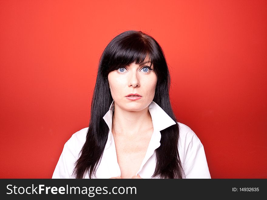 Woman's portrait on red background