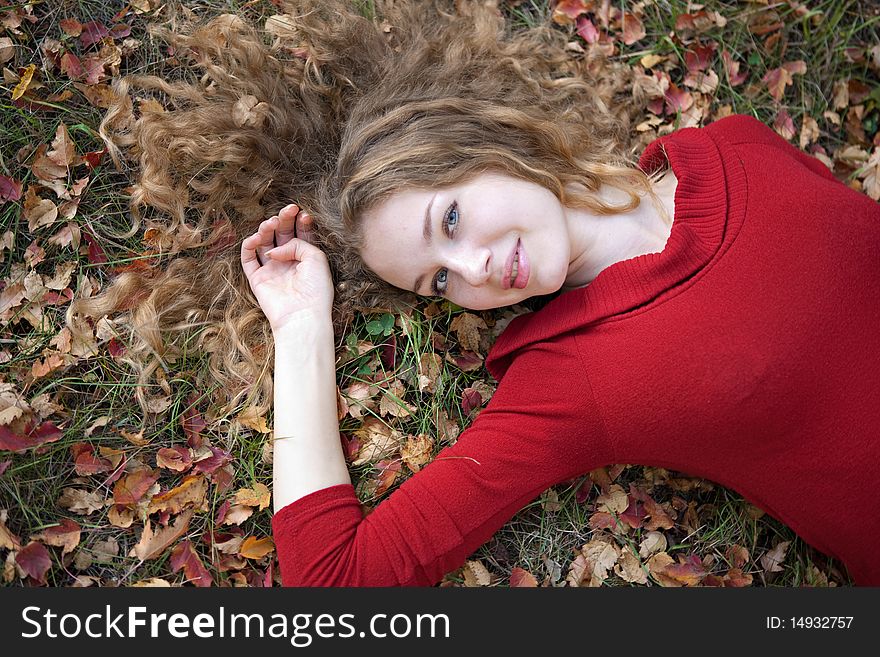 Young beauty woman in autumn outdoor