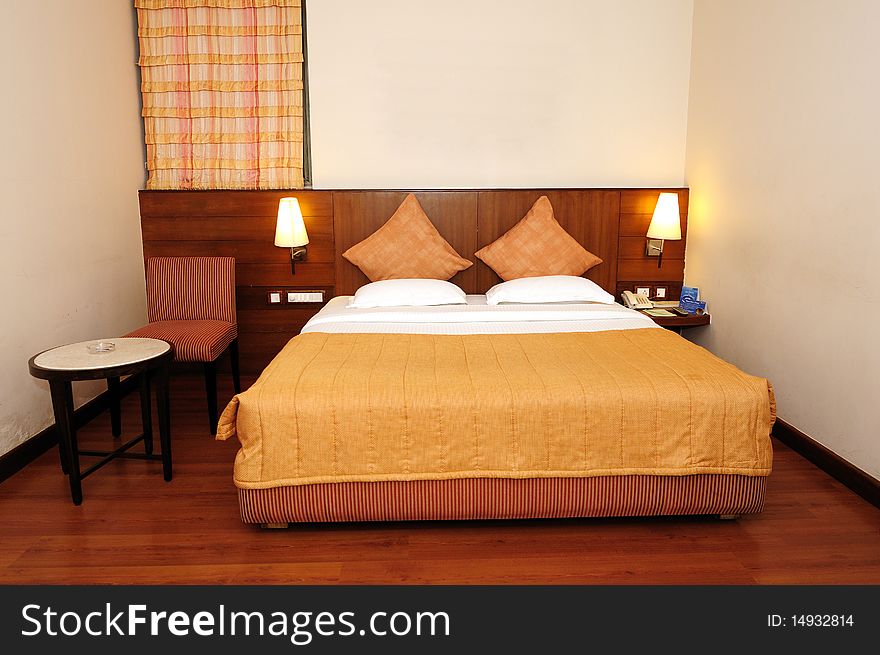A comfortable budget hotel room ready for staying. A comfortable budget hotel room ready for staying
