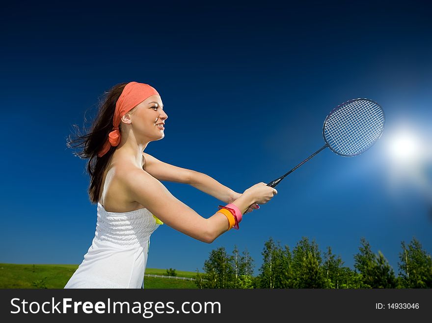 Long-haired girl in kerchief with racket. Long-haired girl in kerchief with racket