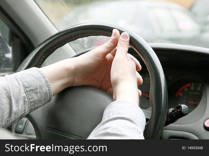 Man with his hand on the wheel. Man with his hand on the wheel