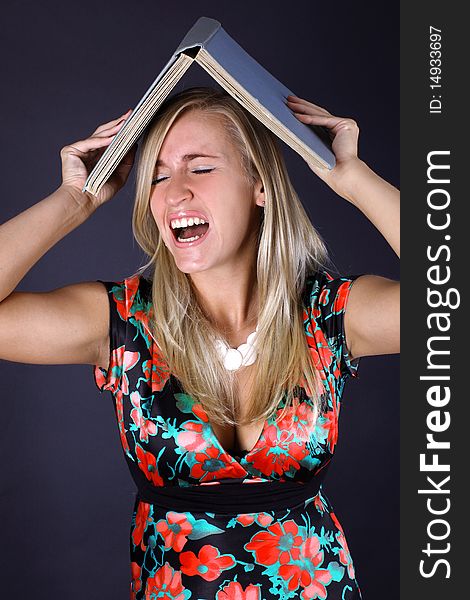 Hard learning - screaming woman with book