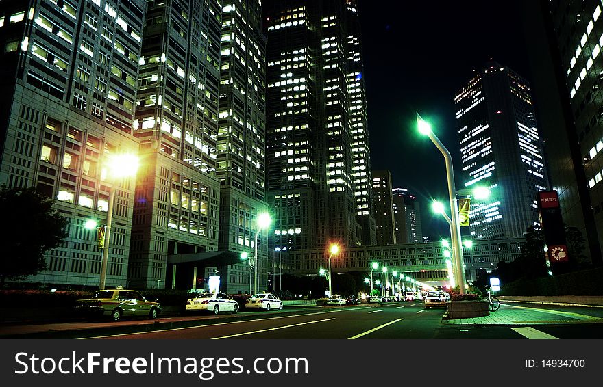 High-rises in West Shinjuku, Tokyo at night. High-rises in West Shinjuku, Tokyo at night.