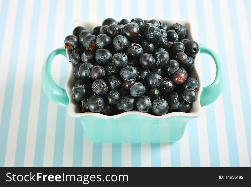 Bowl of blueberries on lines