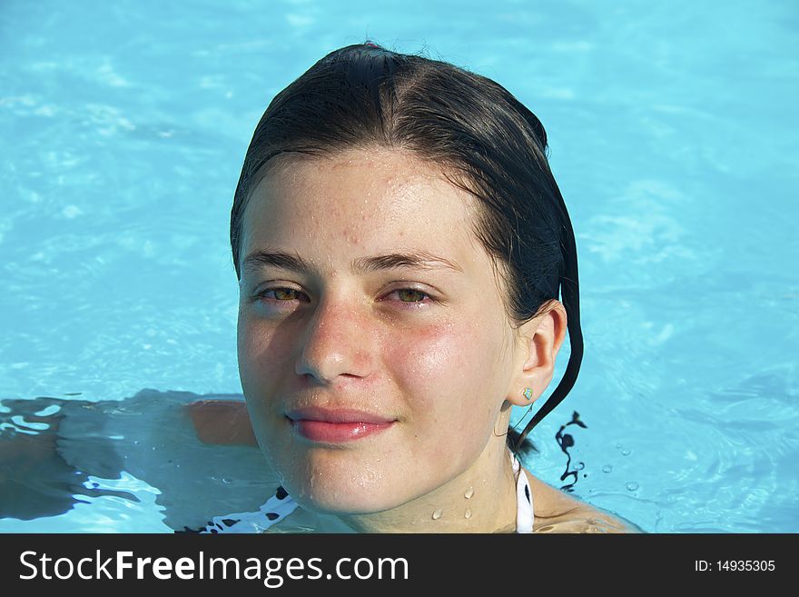 Girl in the swimming pool
