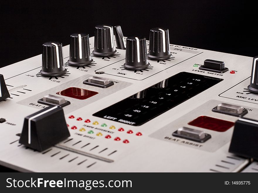 Dj mixer on a black background closeup