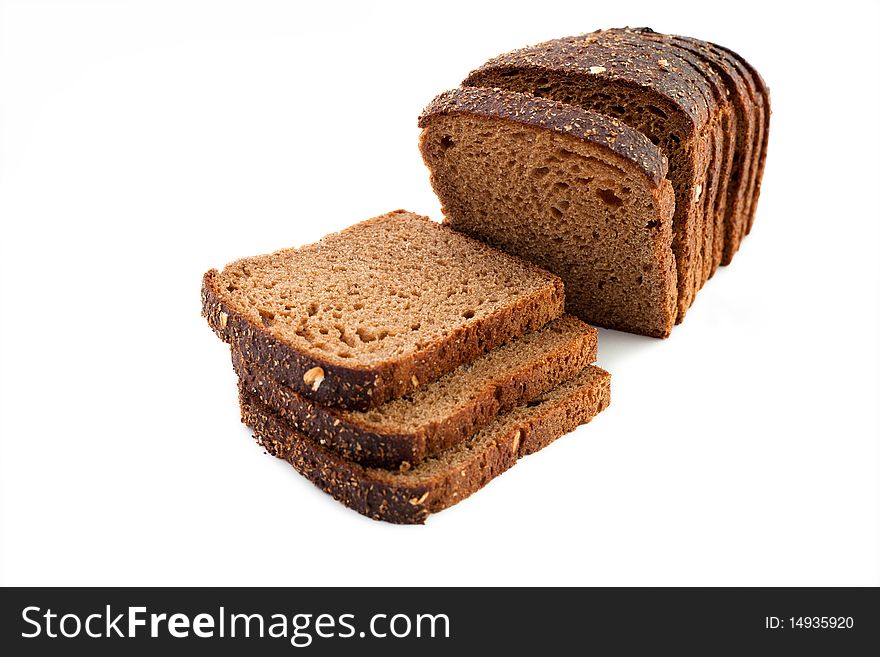 An image of slices of dark bread on white background. An image of slices of dark bread on white background