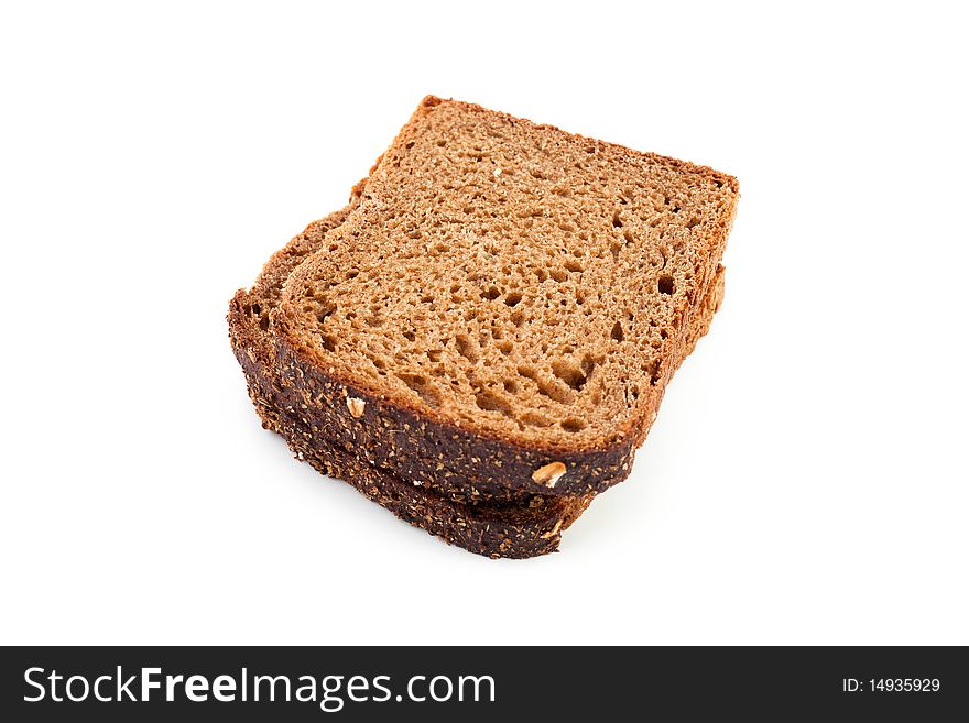 An image of slices of dark bread on white background. An image of slices of dark bread on white background