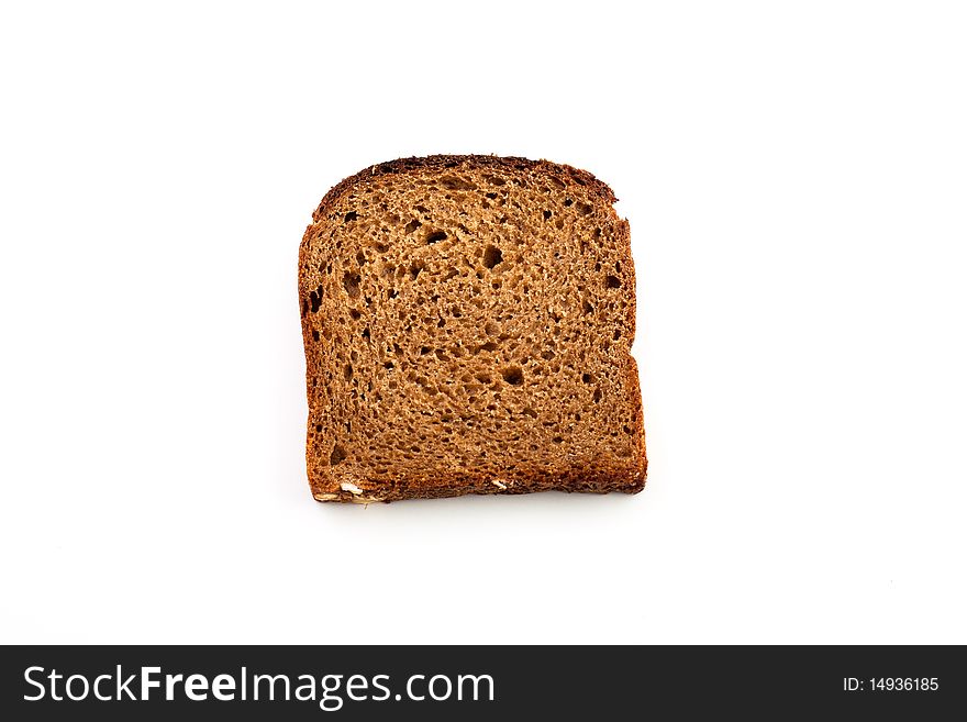 An image of slice of brown bread on white background