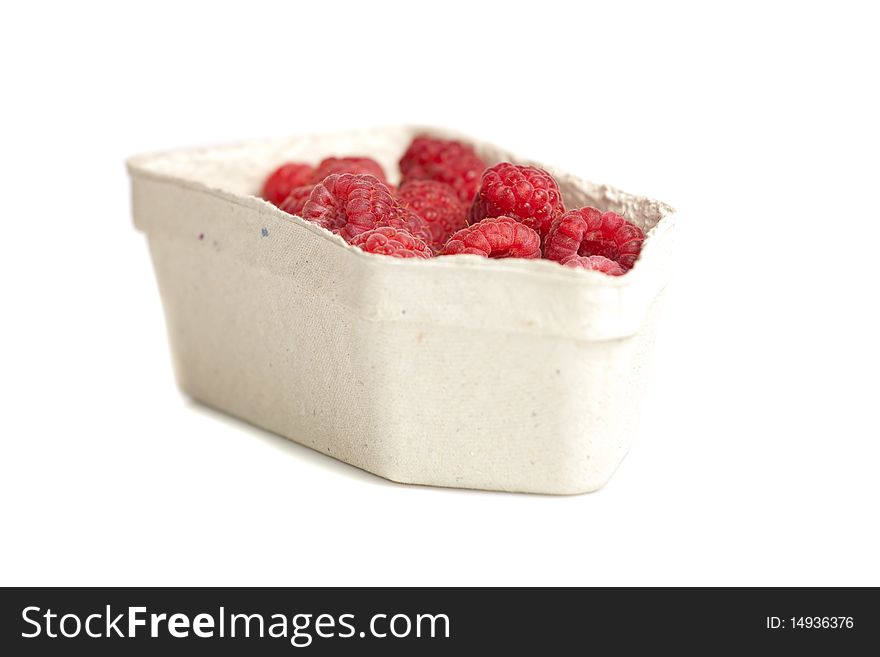 Ripe fresh rapberries on white isolated background