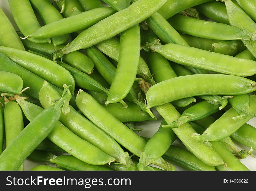 Delicious fresh green peas background
