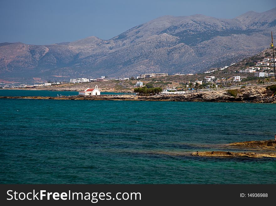 Greek Crete coastline with church and cliffs. Greek Crete coastline with church and cliffs