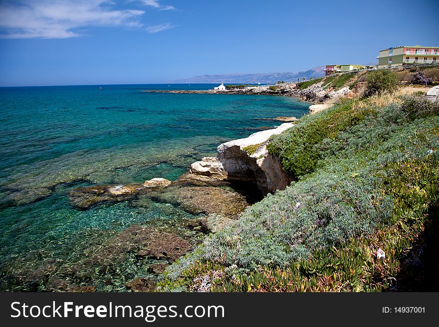 Greek Crete coastline with church and cliffs. Greek Crete coastline with church and cliffs