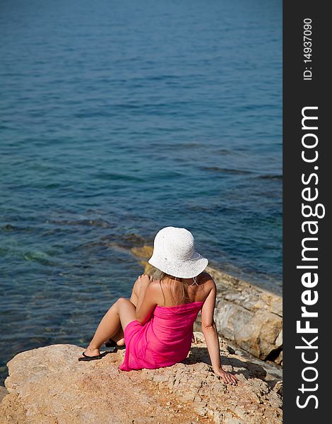 Woman Tanning On Exotic Beach