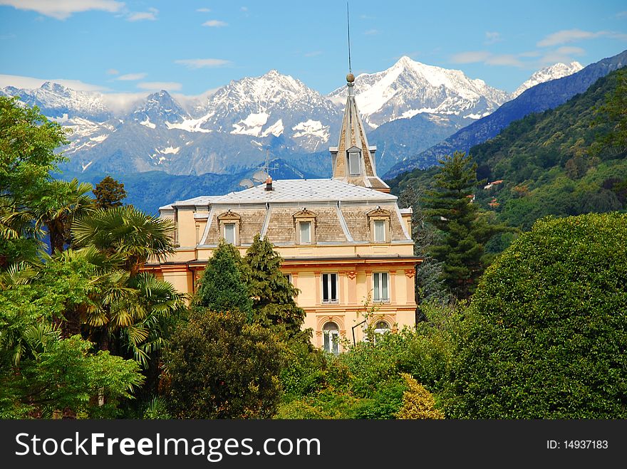 The Villa Taranto gardens, Verbania Pallanza, lake Maggiore, Italy. Alps background. The Villa Taranto gardens, Verbania Pallanza, lake Maggiore, Italy. Alps background.