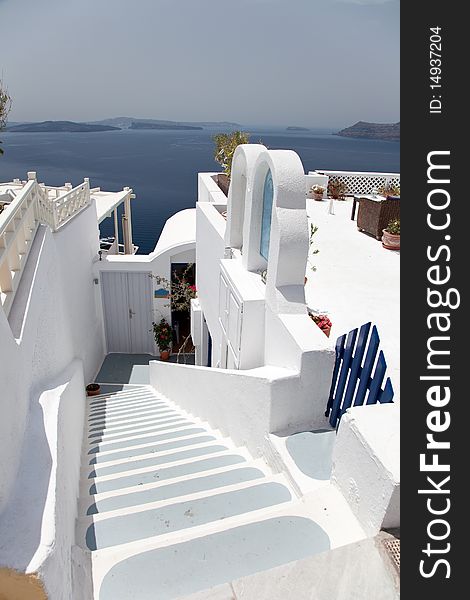 Santorini beautiful volcanic island in Greece landscape with blue churches, windmills and volcanic caldera