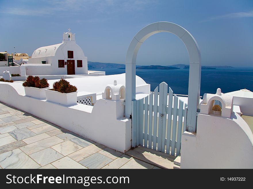 Santorini beautiful volcanic island in Greece landscape with blue churches, windmills and volcanic caldera