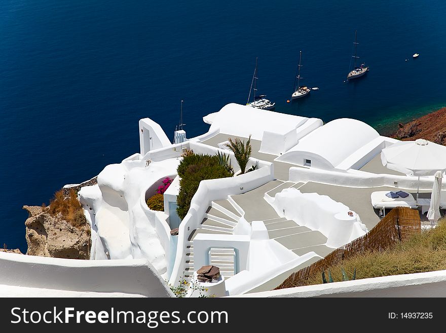 Santorini beautiful volcanic island in Greece landscape with blue churches, windmills and volcanic caldera