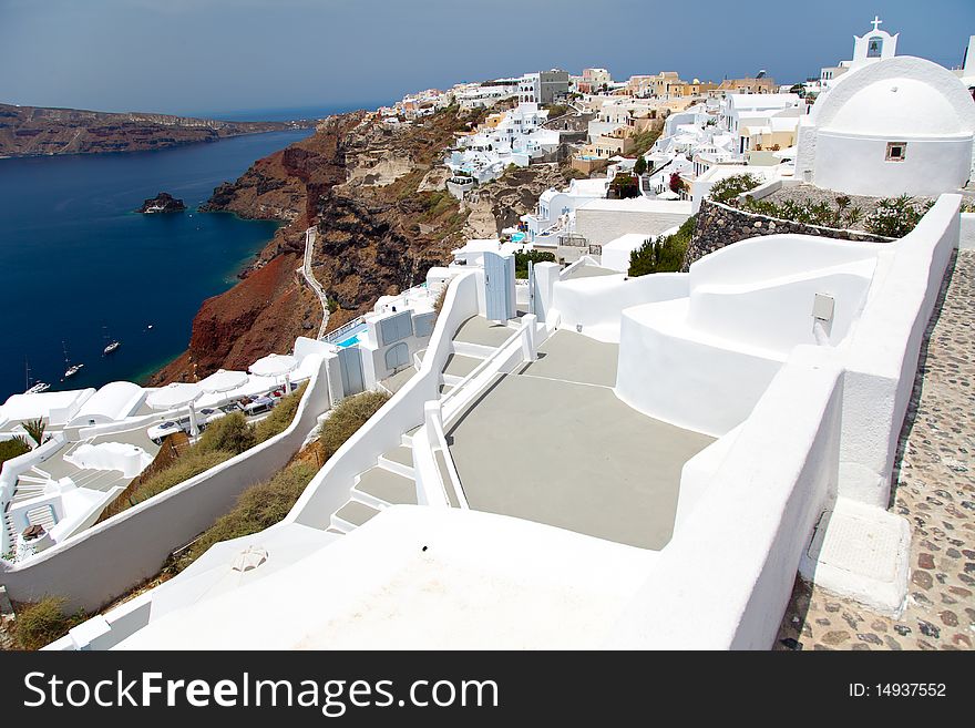 Santorini beautiful volcanic island in Greece landscape with blue churches, windmills and volcanic caldera