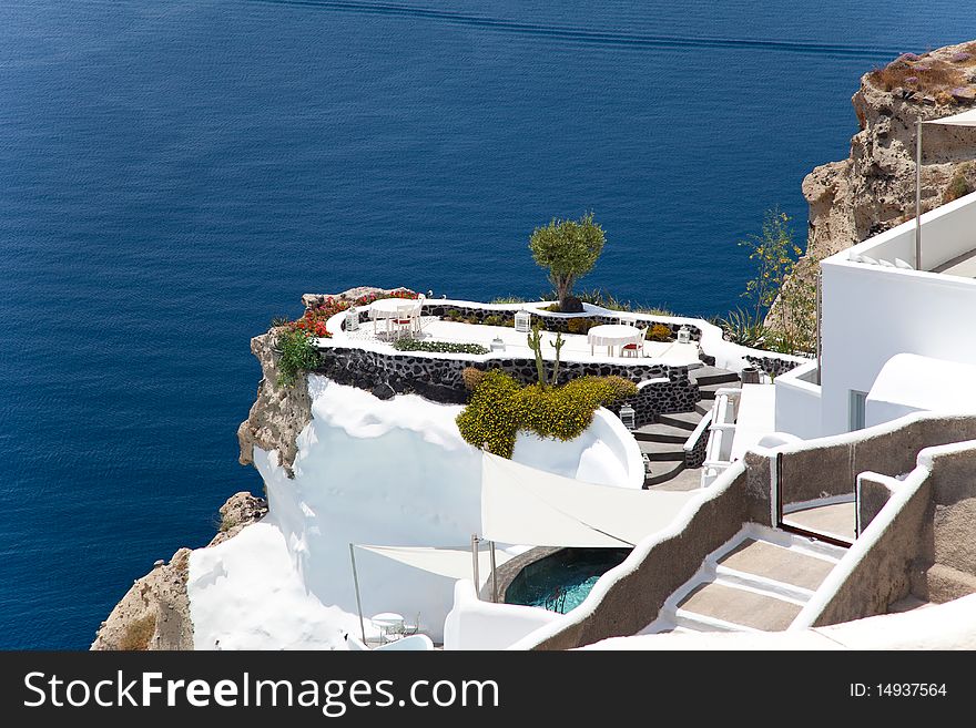 Santorini beautiful volcanic island in Greece landscape with blue churches, windmills and volcanic caldera