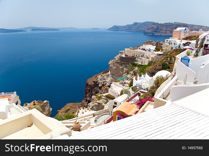 Santorini beautiful volcanic island in Greece landscape with blue churches, windmills and volcanic caldera