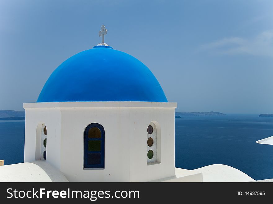 Santorini beautiful volcanic island in Greece landscape with blue churches, windmills and volcanic caldera