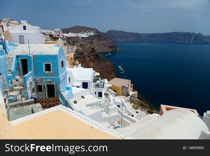 Santorini beautiful volcanic island in Greece landscape with blue churches, windmills and volcanic caldera